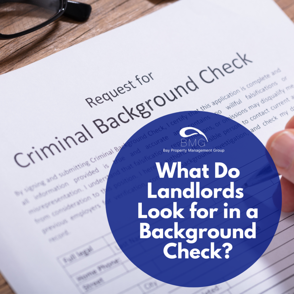 A person signs a form so a landlord can do a criminal background check.